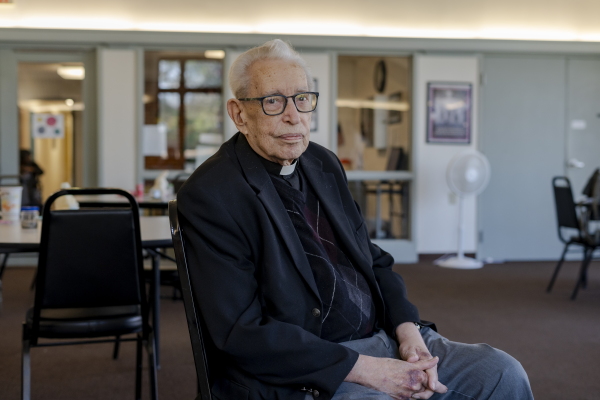 Rev. Richard Bridgford poses for a portrait at his apartment in Trinity Woods, a subsidized senior living center in Emporia, Va., on Friday, Feb. 28, 2025. Photographer: Carlos Bernate for NPR.