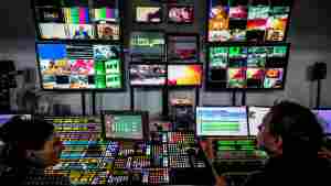 A file photo from June 8, 2018 shows a control room at RT's Moscow studios. The state media organization has been accused by the Justice Department of covertly paying pro-Trump influencers in the U.S.