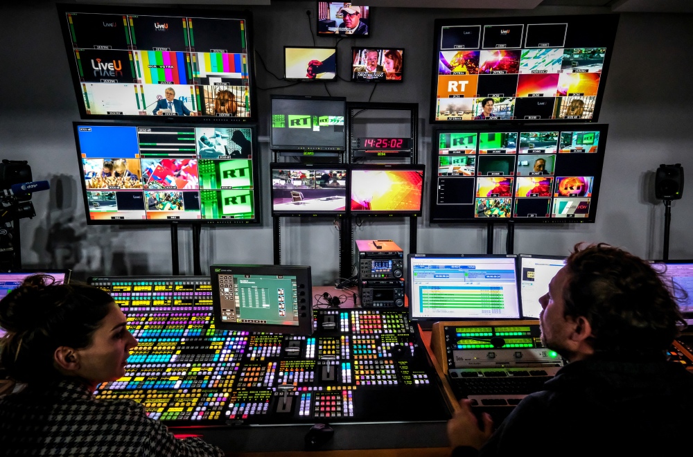 A file photo from June 8, 2018 shows a control room at RT's Moscow studios. The state media organization has been accused by the Justice Department of covertly paying pro-Trump influencers in the U.S. (AFP)