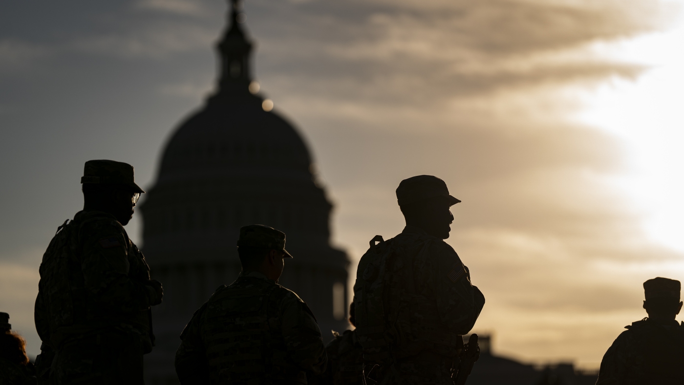 In an encrypted group chat, National Guard members question Trump deployments