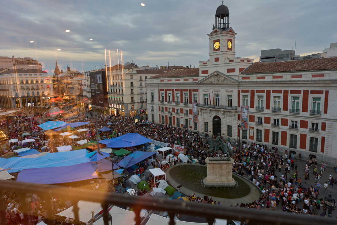 Protesters camp during a protest following the eviction last Wednesday of 87-year-old Maricarmen to demand stronger laws to protect renters at Sol square in Madrid, Spain, Sunday, Sept. 27, 2026.