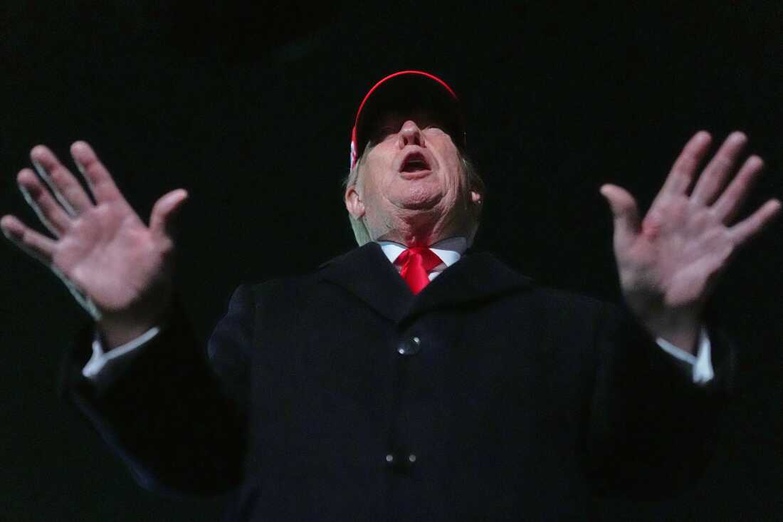 President Donald Trump speaks with reporters at Joint Base Andrews, Md., Sunday, April 12, 2026, after he returned from Miami.