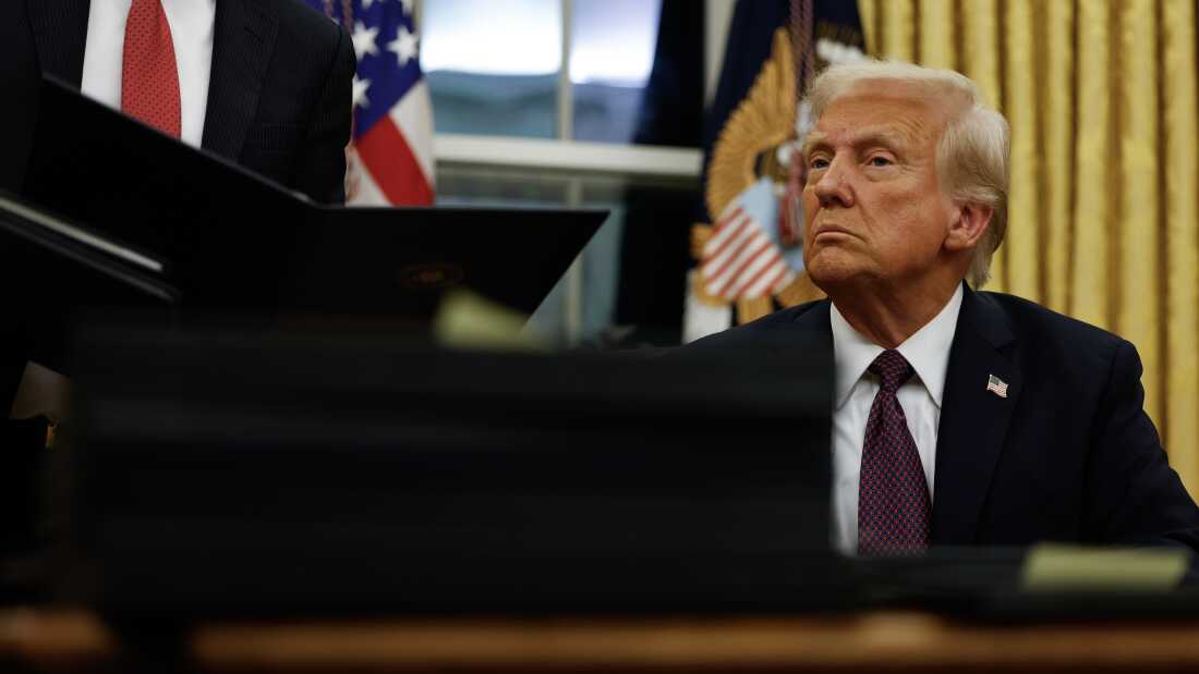 President Trump signs executive orders in the Oval Office on Jan. 20, 2025 in Washington, D.C.