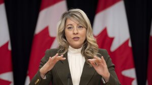 Canada Foreign Affairs Minister Melanie Joly responds to a question during a news conference on tariffs, Wednesday, March 12, 2025, in Ottawa.