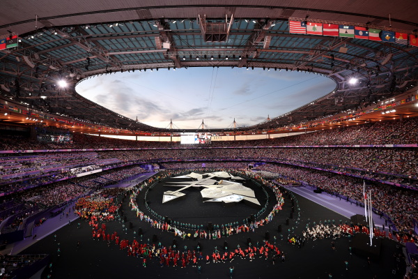 The Paris Olympics closing ceremony dazzles as flag bearers and athletes stream into the Stade de France on the final day of the Summer Games.