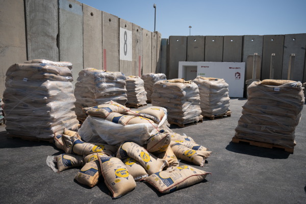 Food and water is stacked and prepared to be loaded on trucks from The Israeli border crossing Kerem Shalom to the Gaza strip on July 10.