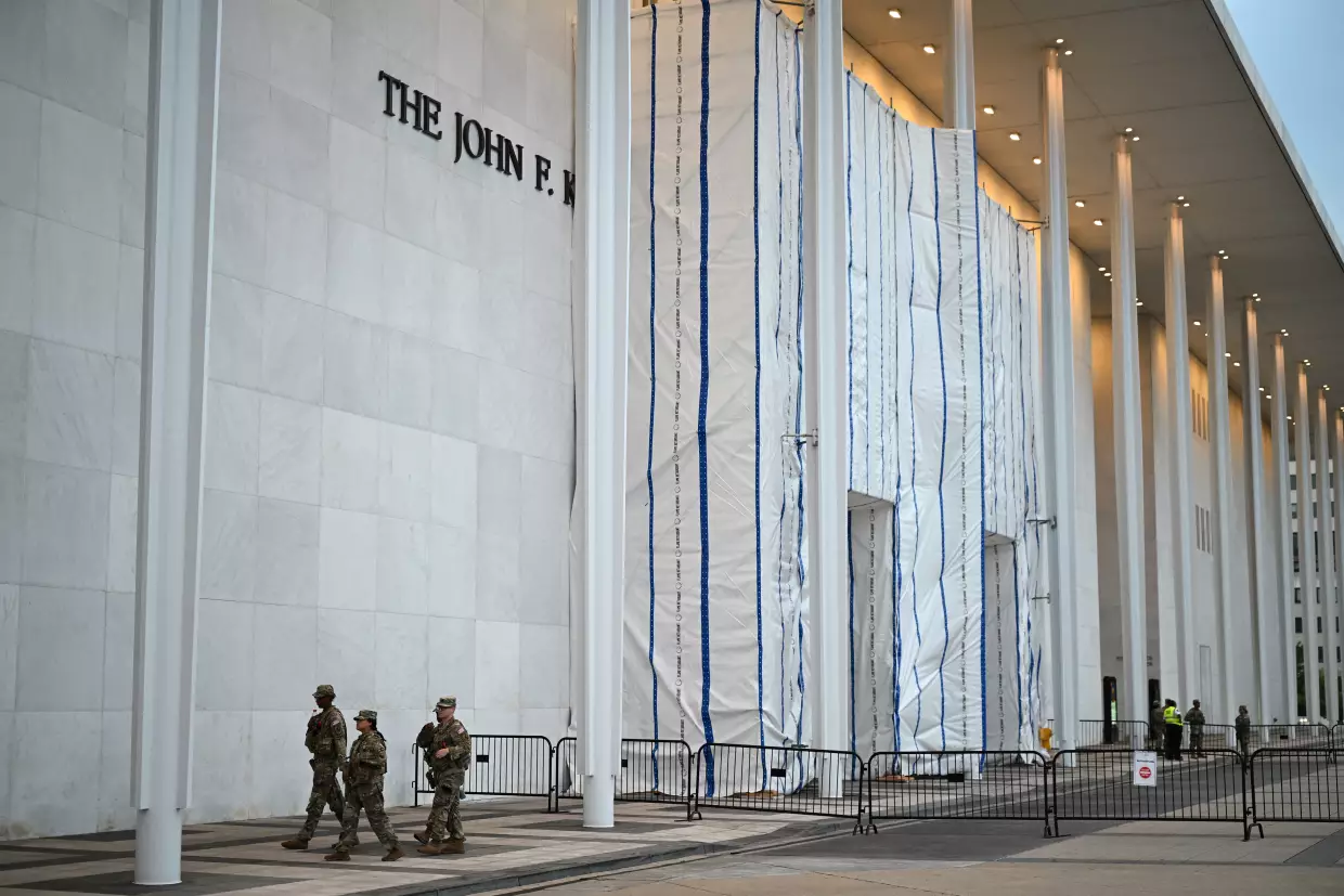 The Kennedy Center on June 28, with its facade signage still covered by a tarp and scaffolding.