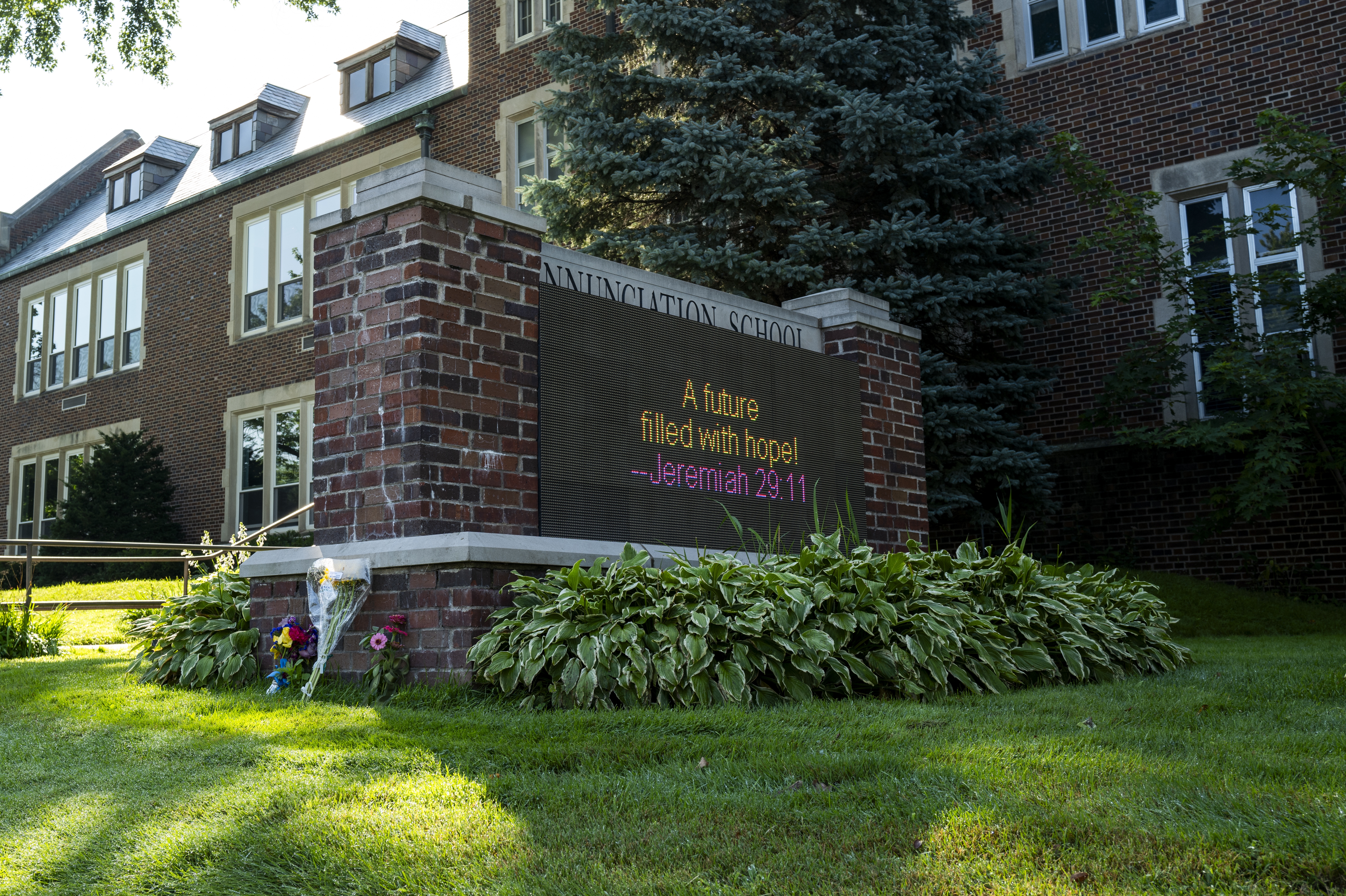 Officials have commended the actions of older children and adults during a mass shooting at the Annuncation Church in Minneapolis.