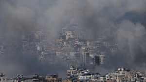 Smoke rises following an Israeli airstrike in Dahiyeh, Beirut's southern suburbs, on Monday.