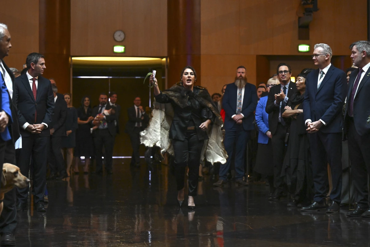 Australian Senator Lidia Thorpe, center, disrupts proceedings as Britain's King Charles III and Queen Camilla attend a Parliamentary reception hosted by Australian Prime Minister Anthony Albanese and partner Jodie Jaydon at Parliament House in Canberra, Australia, Monday, Oct. 21, 2024.