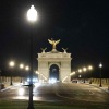 There was no open design competition to select Harrison Design as the architects involved in the 250-foot-tall arch project. Renderings by Harrison Design show the arch at night framing Robert E. Lee's home, Arlington House, behind it.