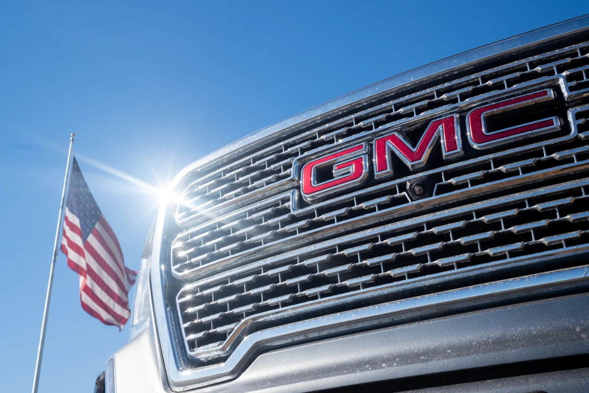AUSTIN, TEXAS: A GMC pickup truck is displayed for sale on a lot at a General Motors dealership in Austin, Texas. Last year, General Motors told investors in its annual report that 'we are committed to fostering a culture of diversity, equity and inclusion.' But in its latest report, published last week, GM doesn't mention diversity once. (Photo by Brandon Bell/Getty Images)