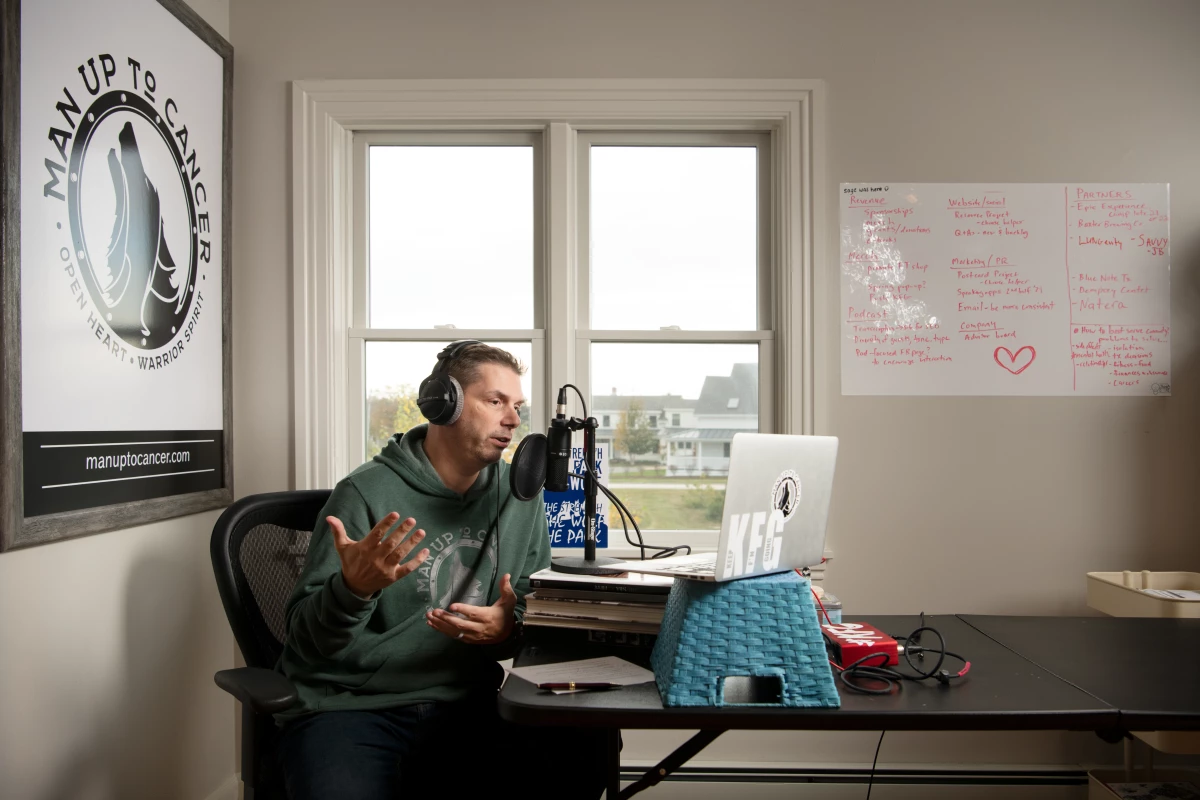 Trevor Maxwell records an episode for the Man Up To Cancer Podcast. Maxwell says the community has grown mostly through word of mouth. 'Oftentimes, the spouse or partner of a man with cancer will hear about us and send their guy our way for support from other men,' says Maxwell.