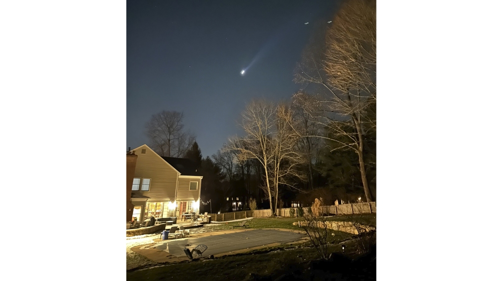 Residents across New Jersey have been trying to decipher who has been flying mysterious drones over the state, with some taking to Facebook to share videos of sightings. Above, a screengrab from video of a potential sighting shared on Facebook. (TMX via AP, File)