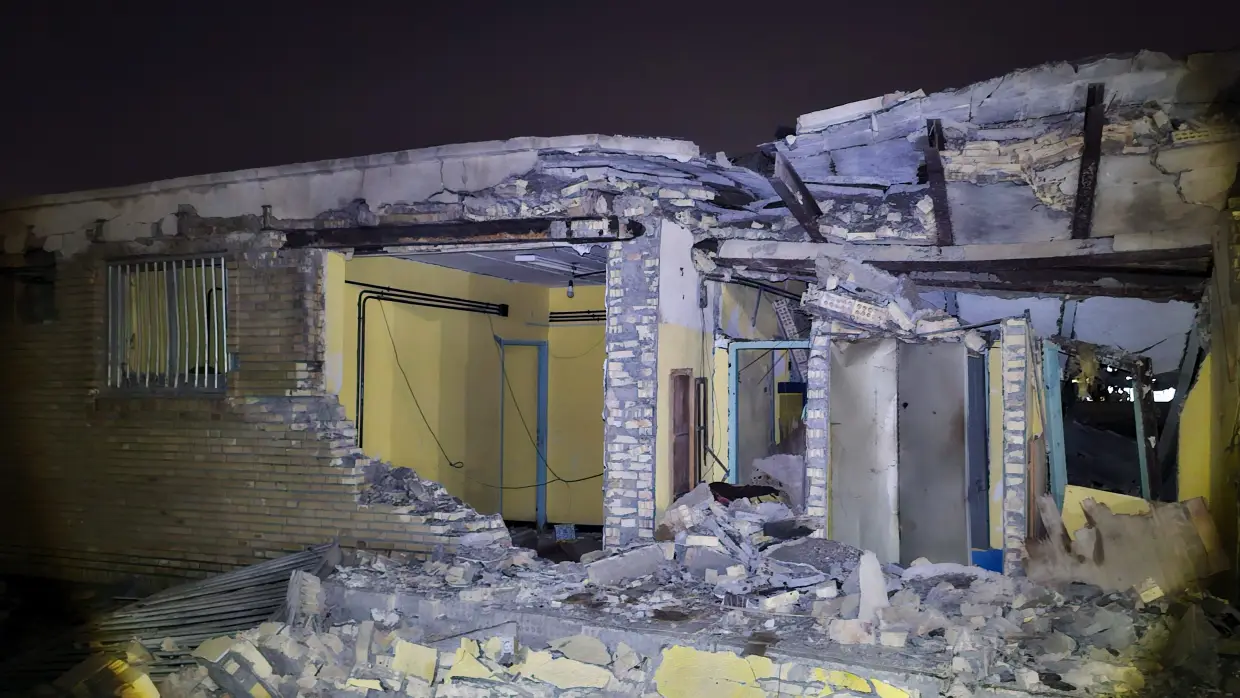 Damage is seen at a building that Iranian media said was hit in a U.S. strike in Kuhestak, southern Iran, early Wednesday.