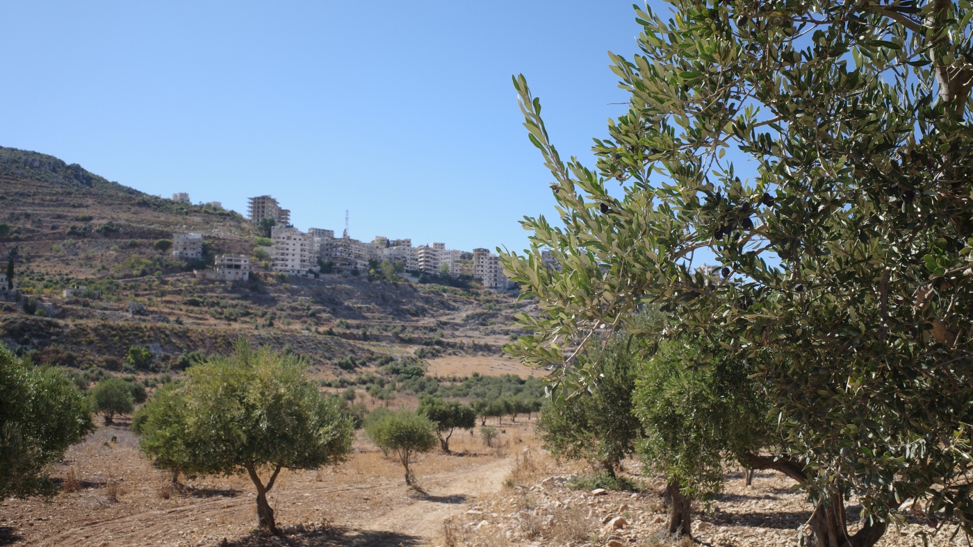 Syrians displaced by battle return to seek out properties occupied : NPR