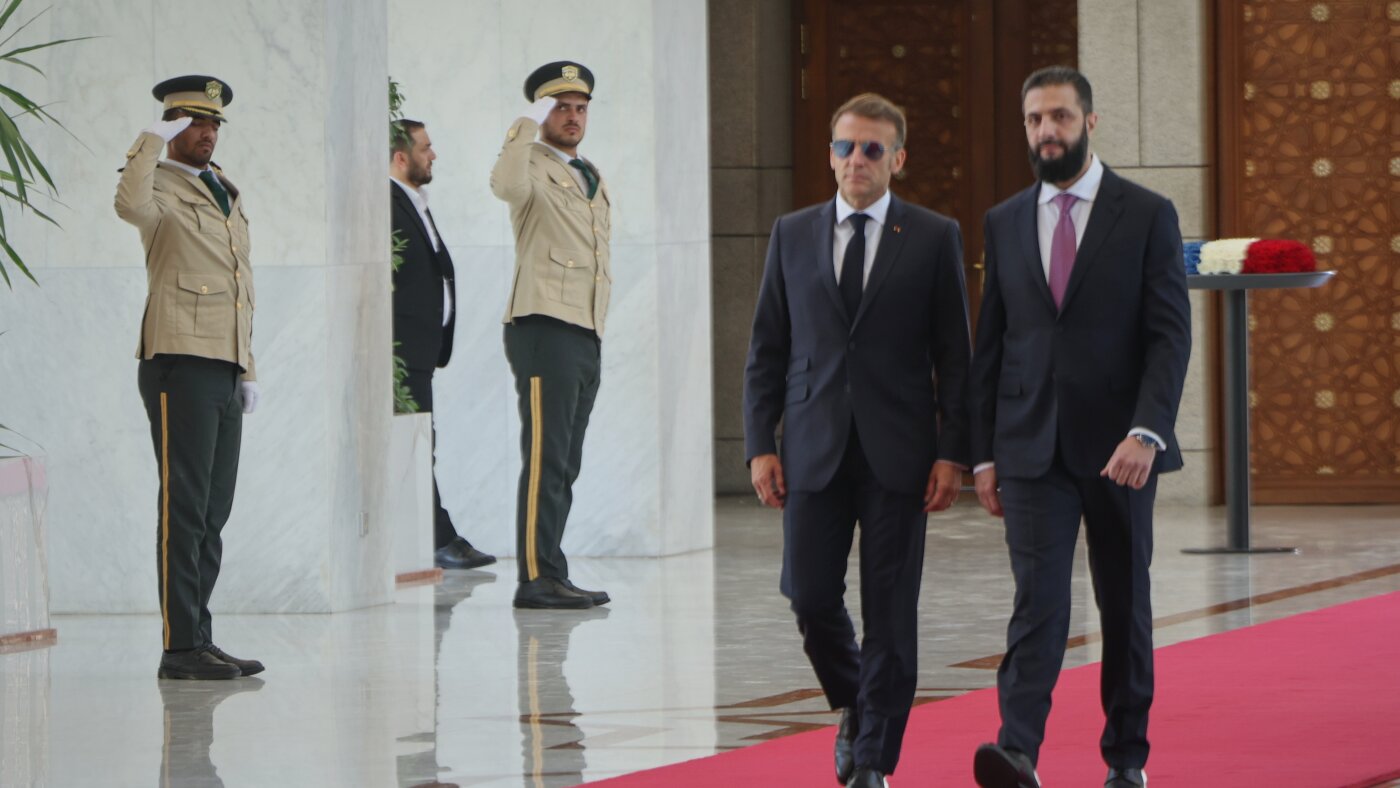Explosions rock Damascus, wounding 4, as French President Macron visits Syria