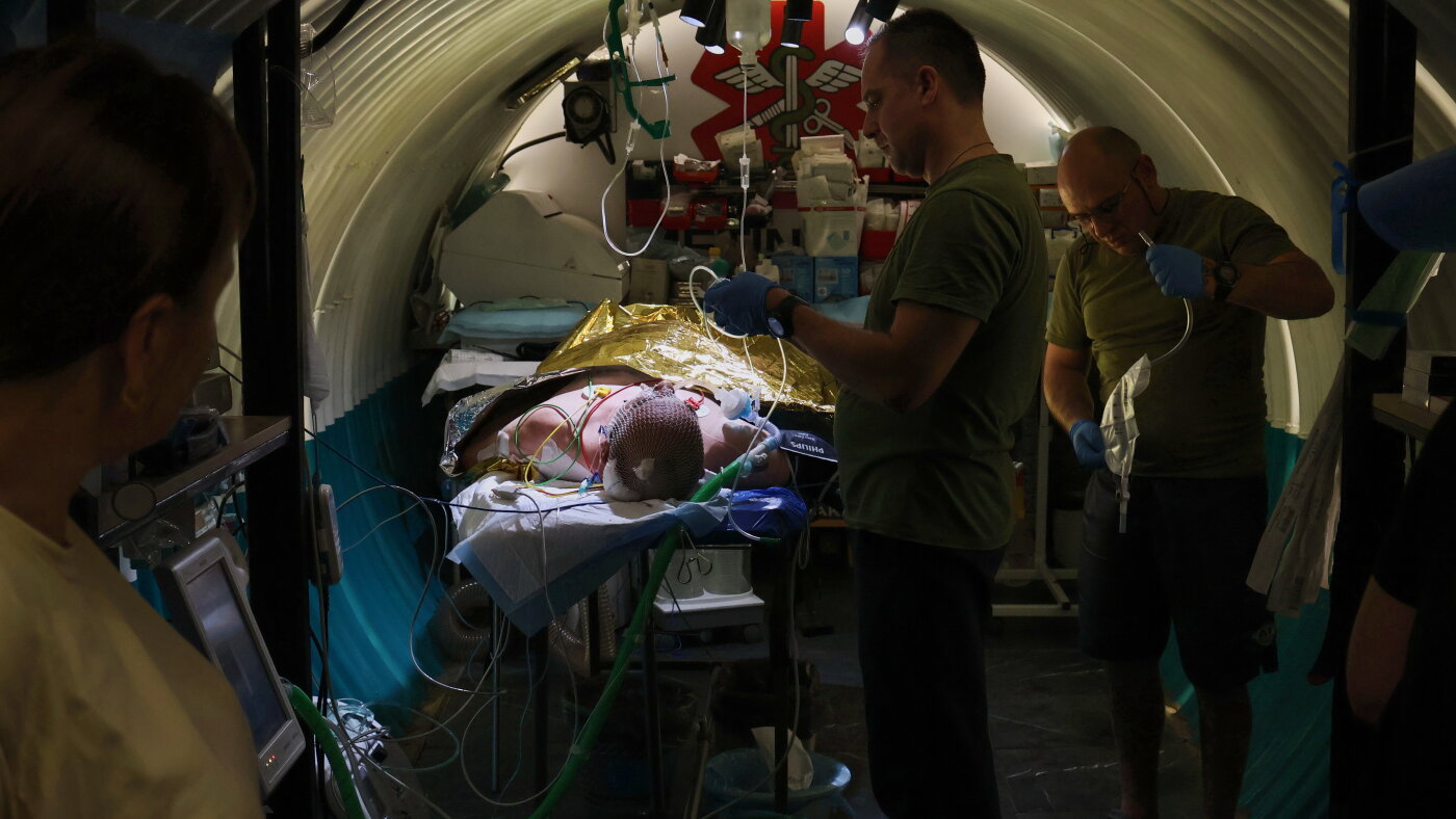 Drones buzz overhead, troops hunker underground in Ukraine's hellish kill zone