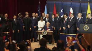 President Trump signs a proclamation committing to countering cartel criminal activity at the Shield of the Americas Summit.
