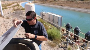 Shawn Kreuzwiesner, utilities director for the Town of Cave Creek, visits the town's pump system in Phoenix on March 27, 2026. Nearly all of the town's water flows through the pumps, which draw Colorado River water from the Central Arizona Project.