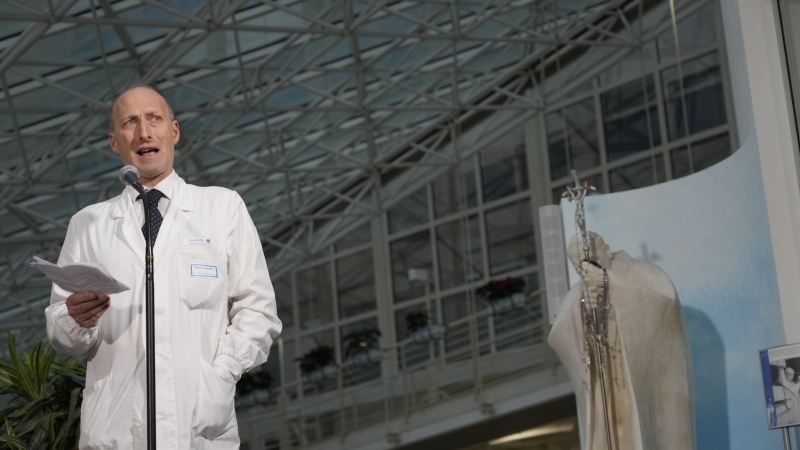 Surgeon Sergio Alfieri speaks to journalists on Saturday in the entrance hall of Rome's Agostino Gemelli Polyclinic, where Pope Francis has been receiving treatment for bilateral pneumonia.