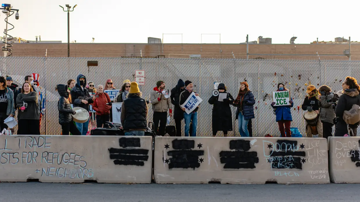 Demonstrators gather within the "free speech zone" near an Immigration and Customs Enforcement processing and detention facility on October 31, 2025, in Broadview, Ill.