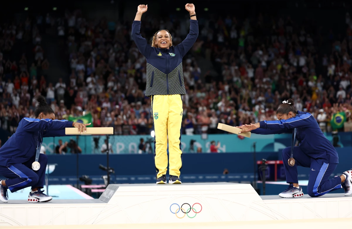 This moment - when silver medalist Simone Biles (L) and bronze medalist (R) Jordan Chiles of the U.S. bowed at gold medalist Rebeca Andrade (C) of Brazil - was one of the most memorable medal ceremonies at the Paris Olympics. Now, with questions swirling about the status of Chiles' bronze medal, it may just be a fleeting memory.