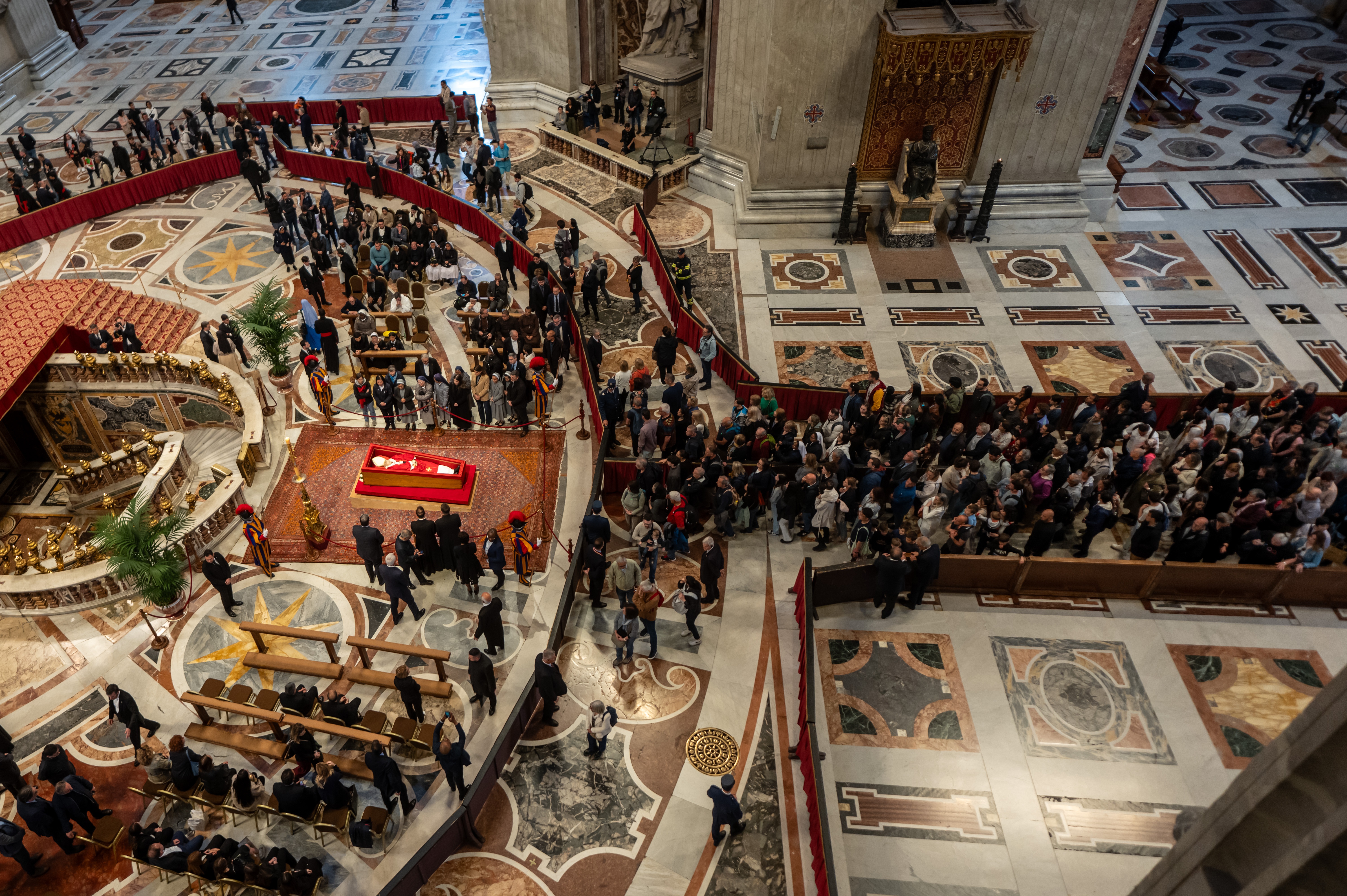 The body of Pope Francis lies in state in St. Peter