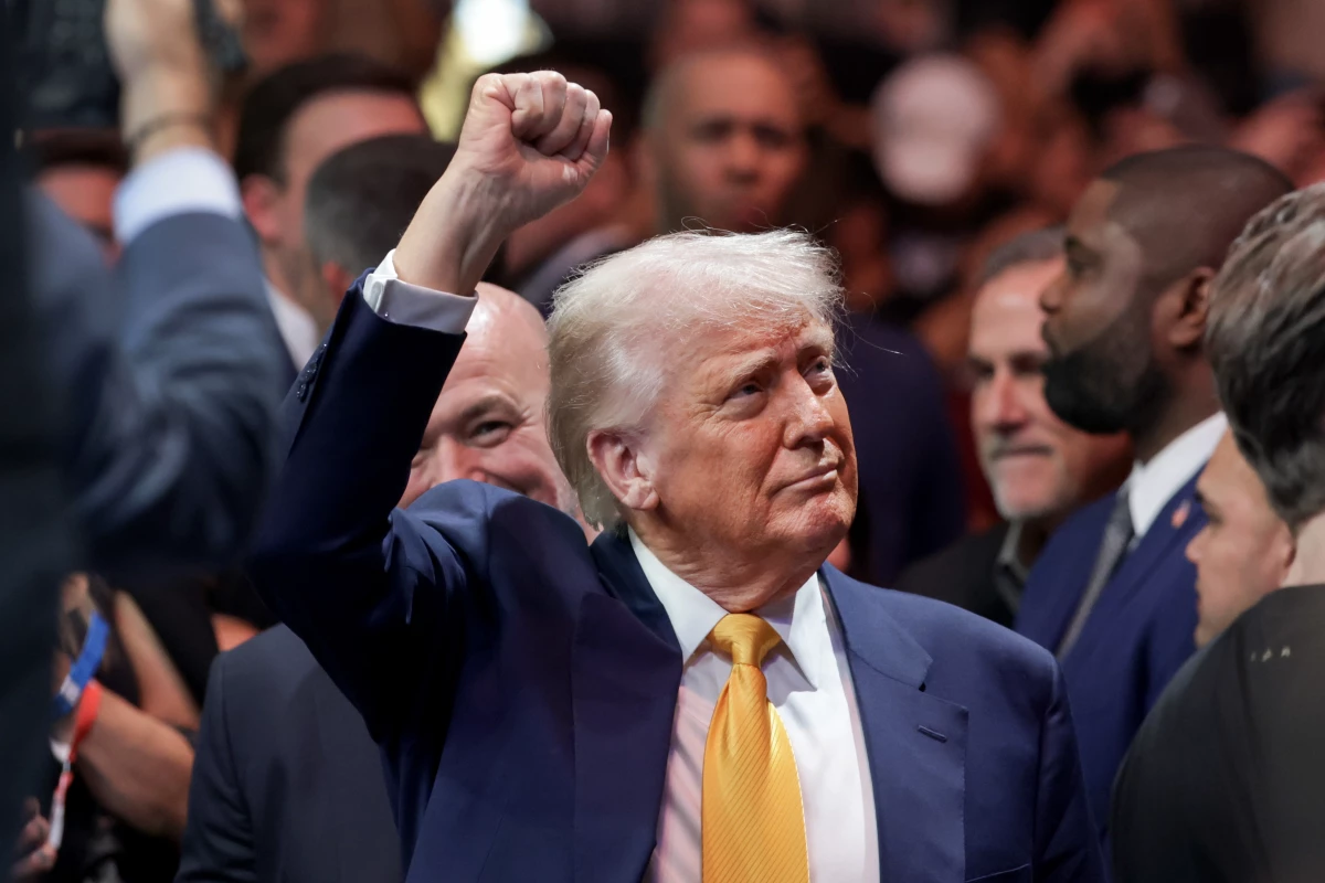 President Trump prepares to watch the Ultimate Fighting Championship at the Kaseya Center on Saturday in Miami, Fla.