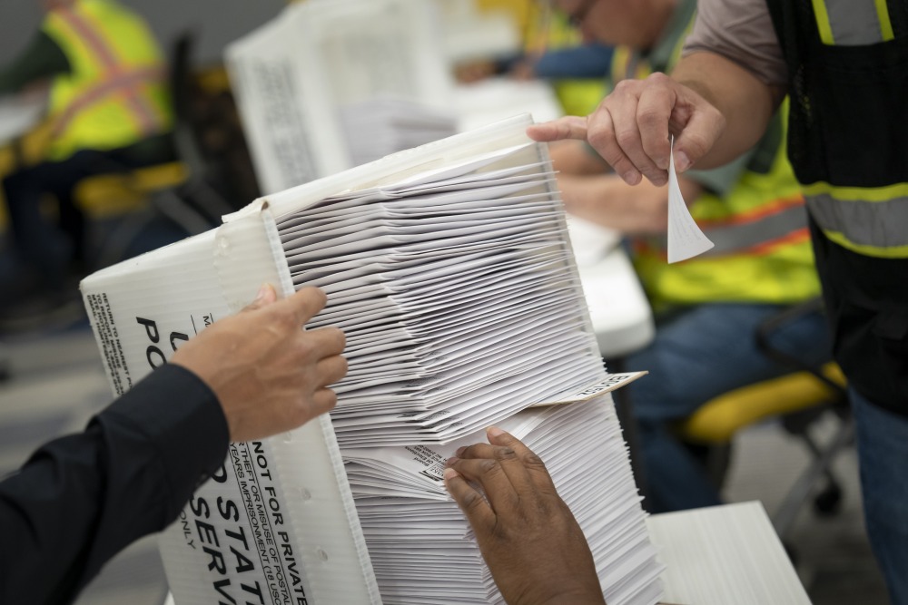 Workers at the Wake County Board of Elections prepare to mail absentee ballots in September in Raleigh, N.C. (Getty Images)