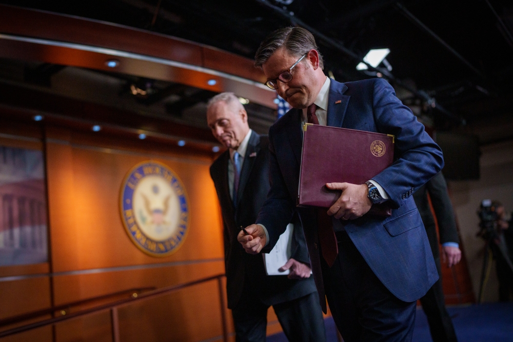 Speaker of the House Mike Johnson, R-La., (right) departs a news conference alongside House Majority Leader Steve Scalise, R-La., at the U.S. Capitol on Tuesday. (Getty Images)