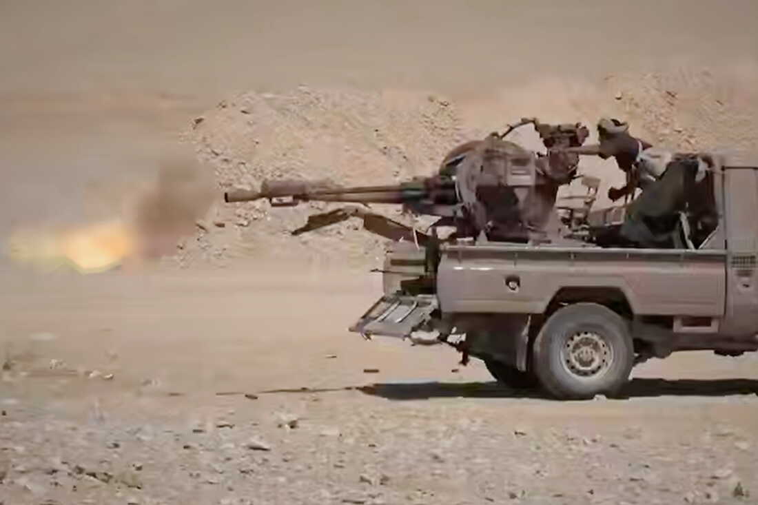 This image taken from an undated video released Tuesday, Sept. 15, 2026, by the Ansar Allah Media Office, the media arm of Yemen's Houthi rebels, shows what the group says are Houthi fighters firing a weapon mounted on a pickup truck during combat with Saudi-backed forces in eastern Jawf, Yemen.