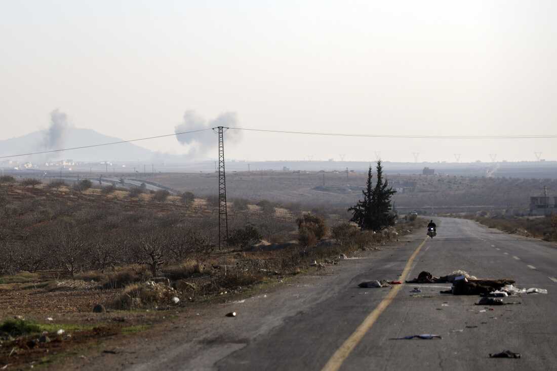 Smoke from fighting billows in the edges of the town of Hama, Syria, Tuesday Dec. 3, 2024.