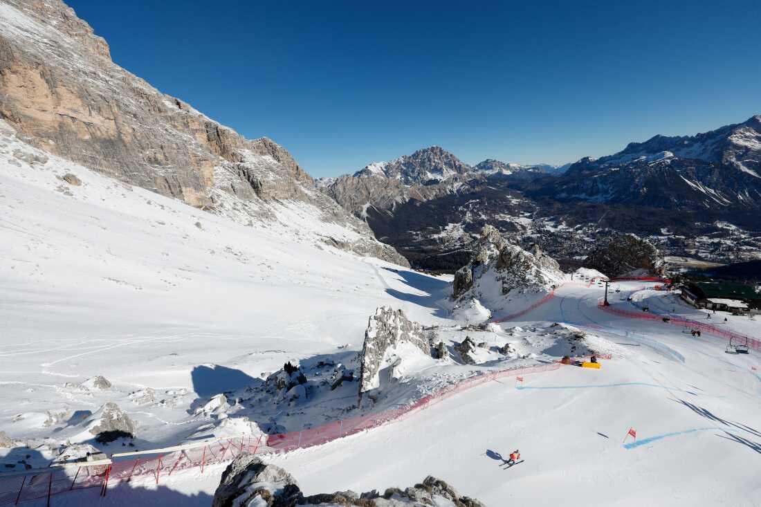 FILE - A skier trains at the Milan Cortina 2026 Winter Olympics venue in the Dolomite Mountains in Cortina d'Ampezzo, Italy, on Jan. 17, 2025. (AP Photo/Alessandro Trovati, File)