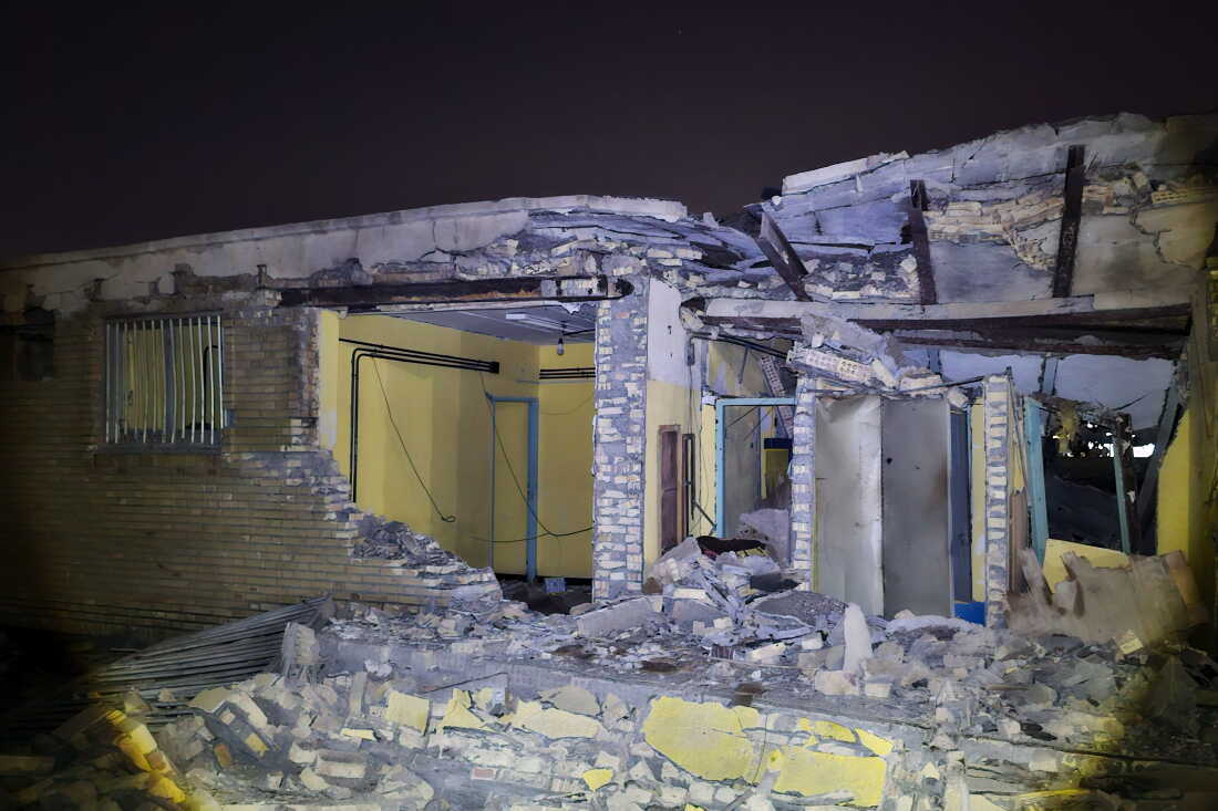 Damage is seen at a building that Iranian media said was hit in a U.S. strike in Kuhestak, southern Iran, early Wednesday.