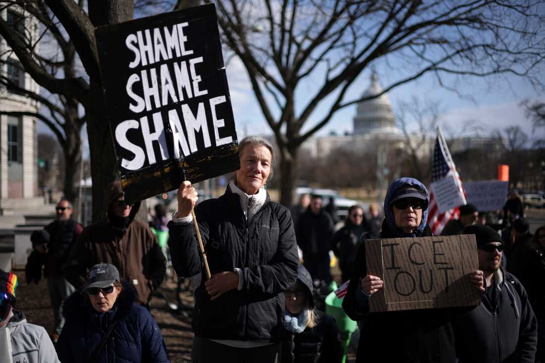 Activists participate in a protest prior to a march to the headquarters of U.S. Immigration and Customs Enforcement (ICE) on Sunday in Washington, D.C.