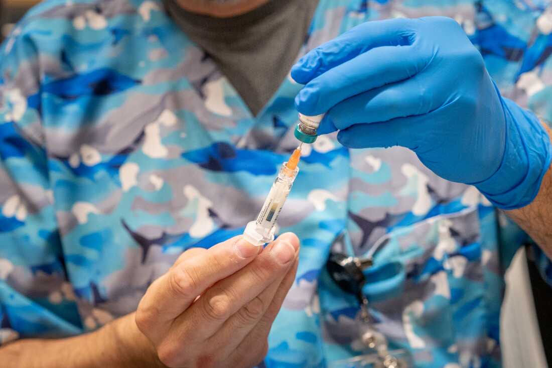 Raynard Covarrubio fills a syringe with the MMR vaccine, at a vaccine clinic put on by Lubbock Public Health Department on March 1 in Lubbock, Texas. West Texas saw a measles outbreak this year.