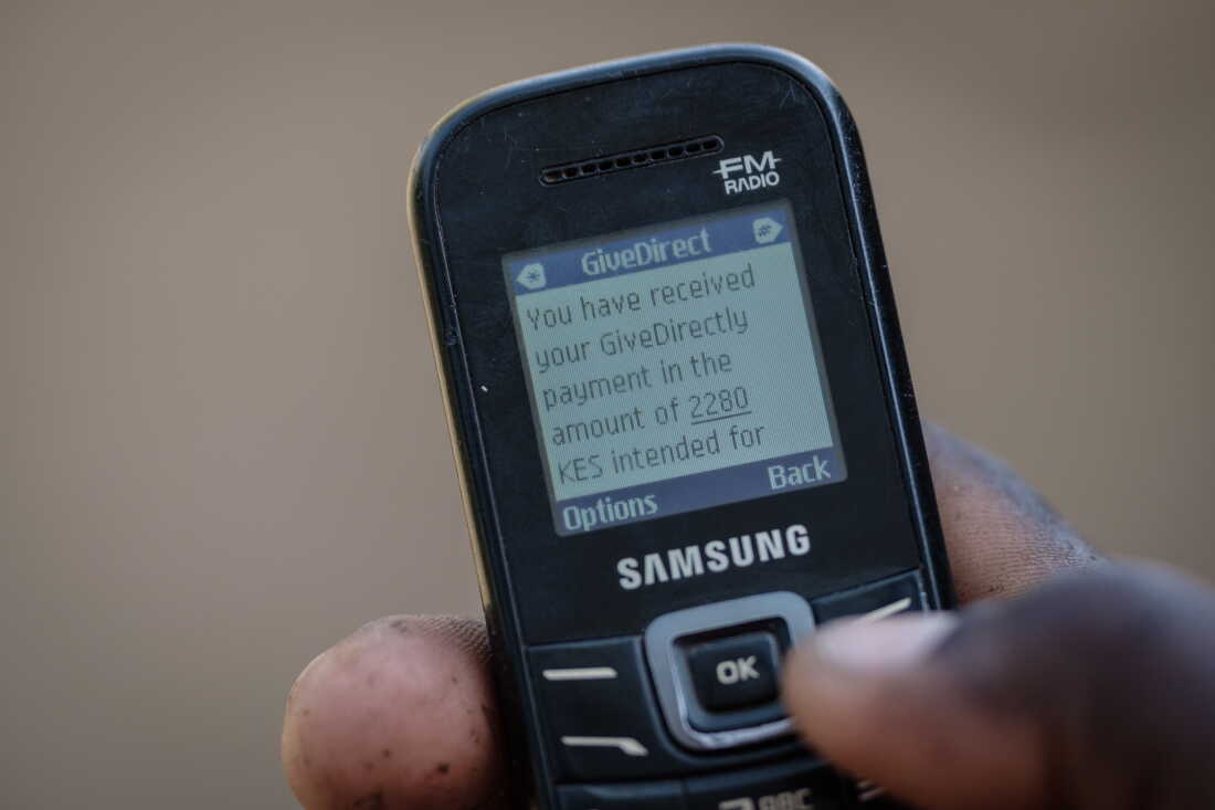 Cash transfers, aimed at lifting families out of poverty, are delivered by mobile pone.
