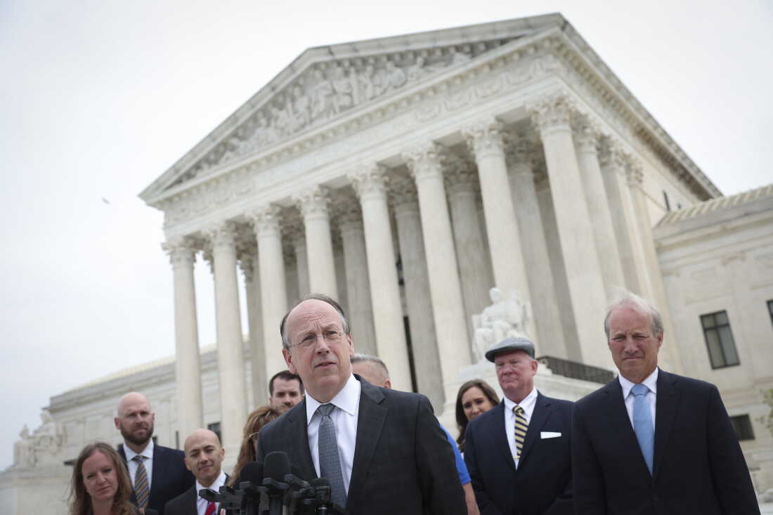 Attorney Paul Clement answers questions outside the U.S. Supreme Court after oral arguments in April 2022 in Washington, D.C.