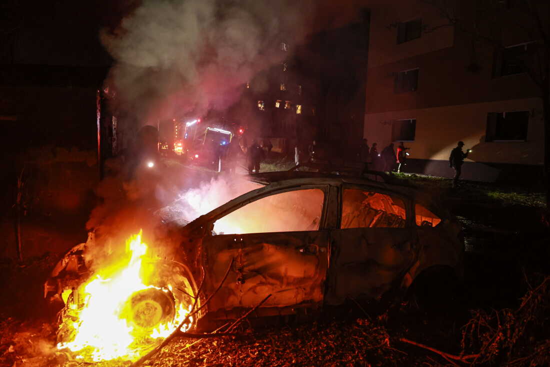 A car burns after a Russian airstrike on a residential neighborhood in Zaporizhzhia, Ukraine, on Saturday.