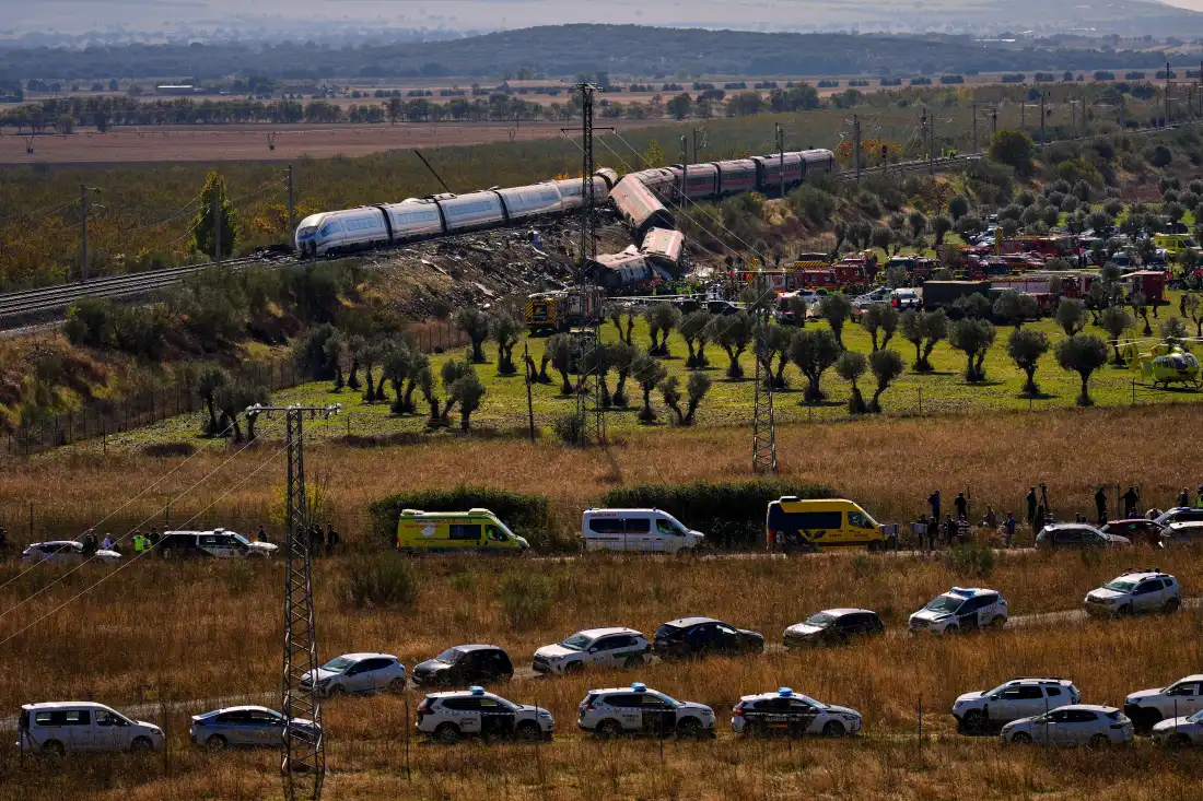 Emergency services work at the scene of a collision between two trains in Urda, Spain, on Wednesday, Oct. 28, 2026.