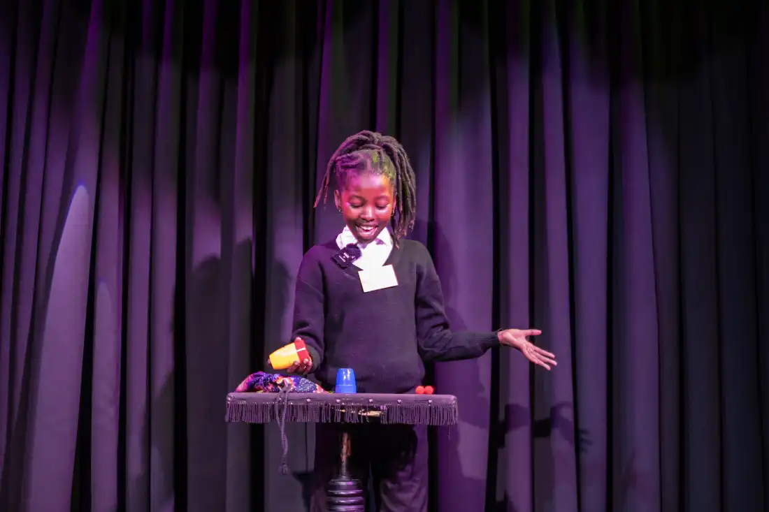 Aspiring magician Kungentanda Ndenetya performs during the annual junior magic contest at the Cape Town College of Magic.