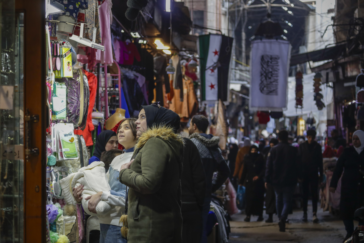 Shoppers fill the old city market in Damascus, Syria, Jan. 9.