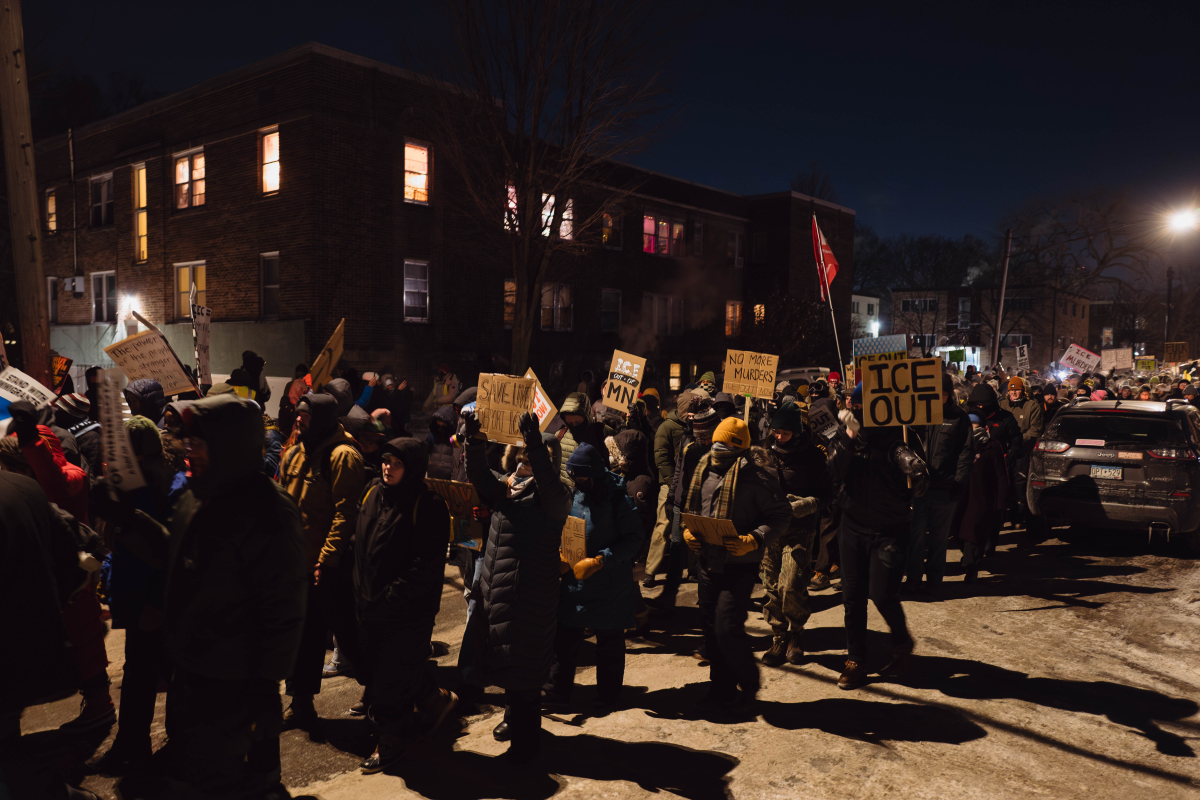 Minneapolis residents and protesters march through the streets during a vigil for Alex Pretti, who was fatally shot by a federal agent during an immigration enforcement operation.