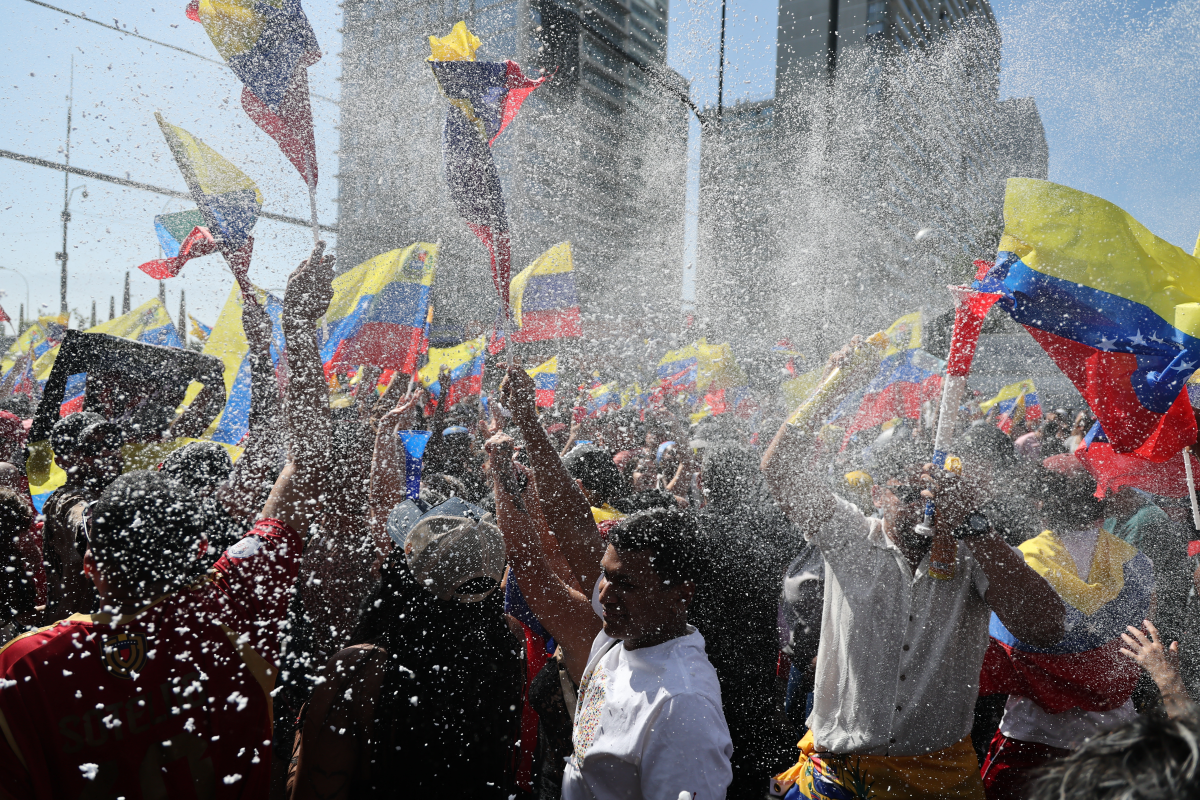 Venezuelans living in Chile celebrate in Santiago on Jan. 3, 2026, after U.S. forces captured Venezuelan leader Nicolas Maduro after launching a 'large scale strike' on Venezuela.
