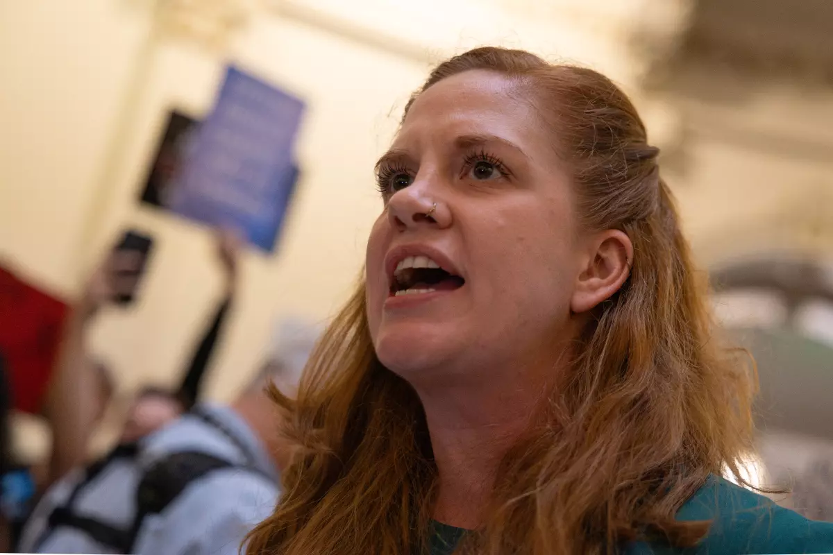 State Sen. Molly Cook, D-Houston, shown here giving a speech during a protest against redistricting, was the only senator to vote against the ban on selling vapes containing cannabinoids.