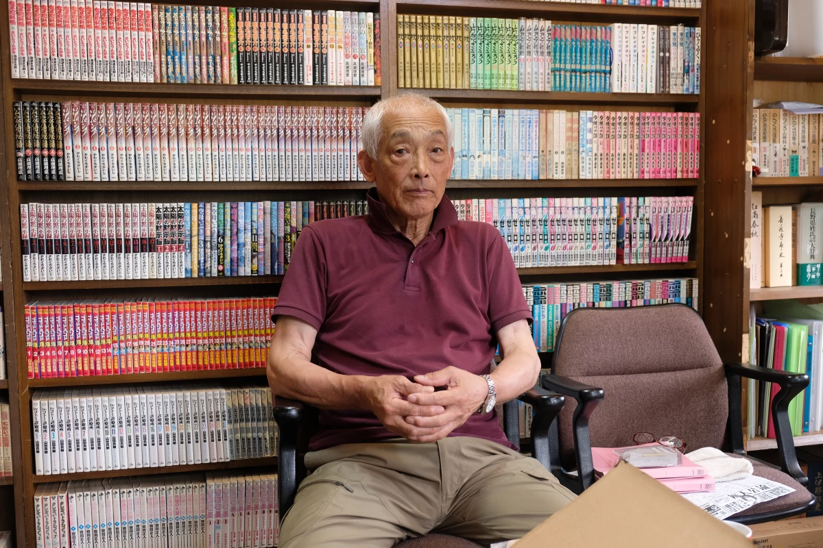 Katsutoshi Takegami, 77, speaks during an interview in his home in Nagano prefecture, Japan. Takegami began researching his father's service in the army after finding photos in his father's trunk several years ago.
