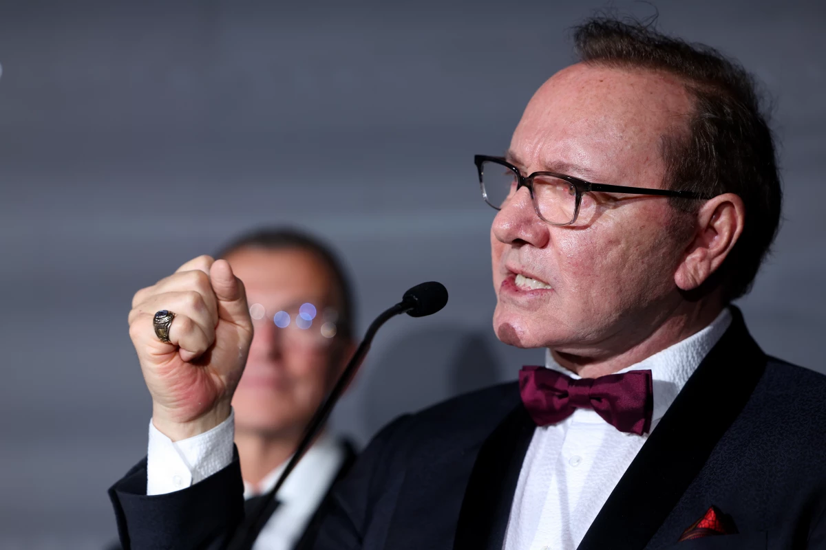 Kevin Spacey speaks on stage at the Better World Fund Gala in Cannes, France, where he was honored with a lifetime achievement award.