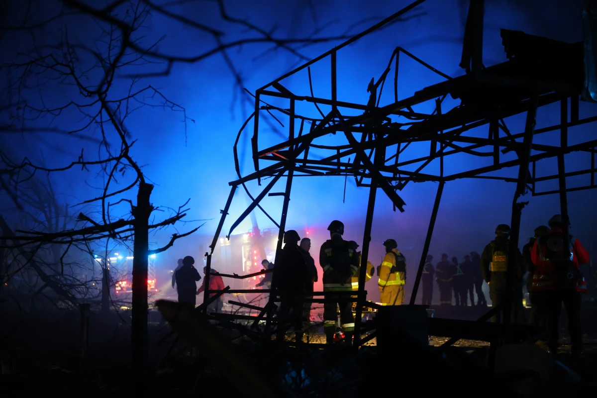 Rescuers work at a market destroyed by a Russian airstrike on Zaporizhzhia, Ukraine, on Friday.
