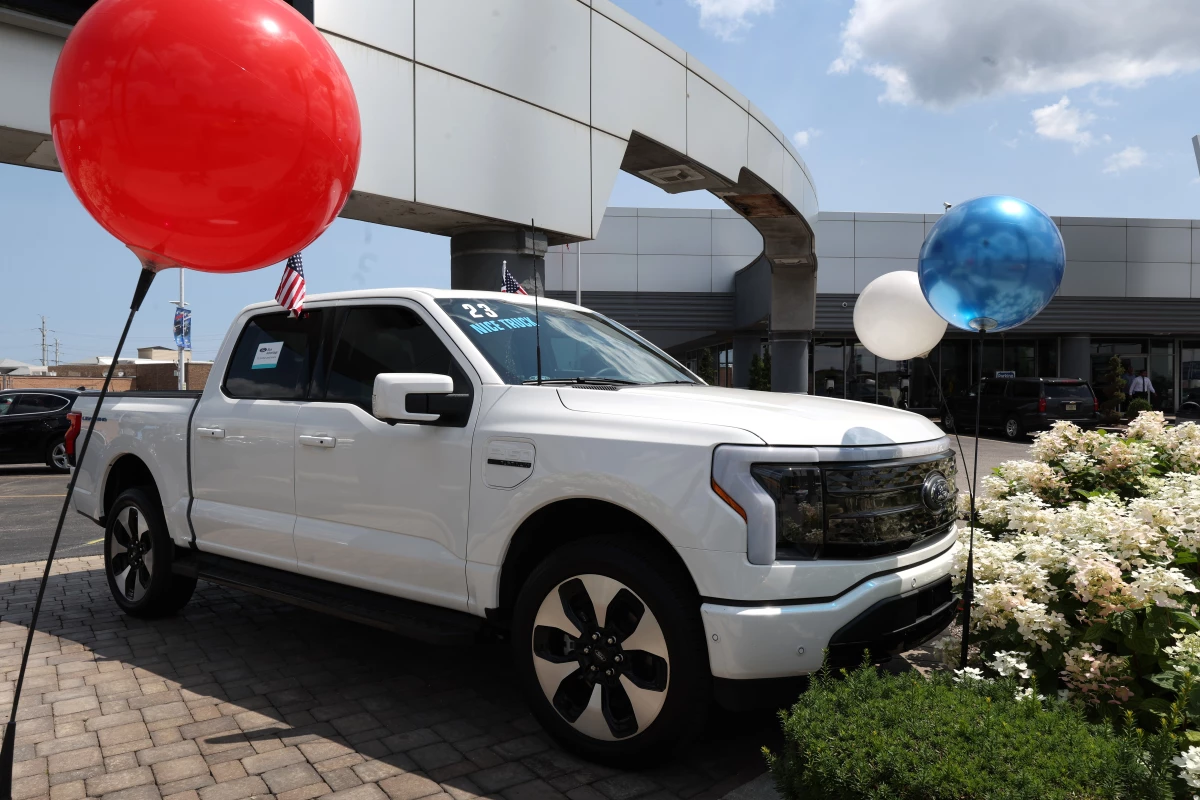 NILES, ILLINOIS - JULY 18: A 2023 Ford F-150 Lightning EV is offered for sale at Golf Mill Ford on July 18, 2023 in Niles, Illinois. Yesterday Ford announced that it was cutting prices on the Lightning truck by as much as $10,000. (Photo by Scott Olson/Getty Images)